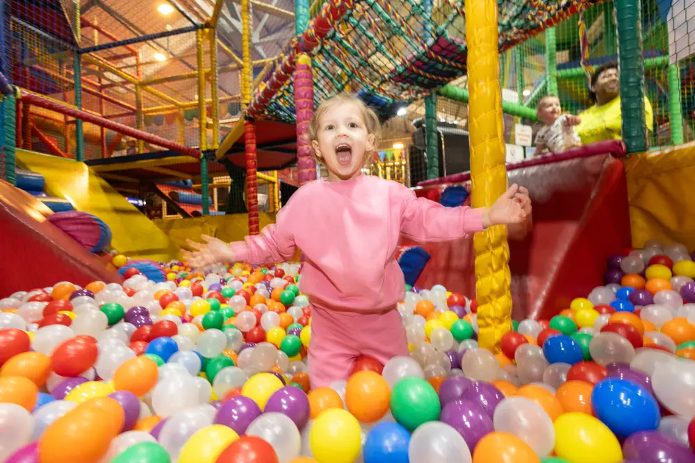 Toddler in ball pit